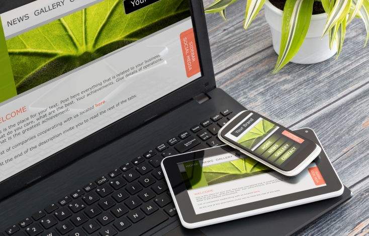 Responsive Web Design displayed through looking at a website on a phone, laptop, and tablet